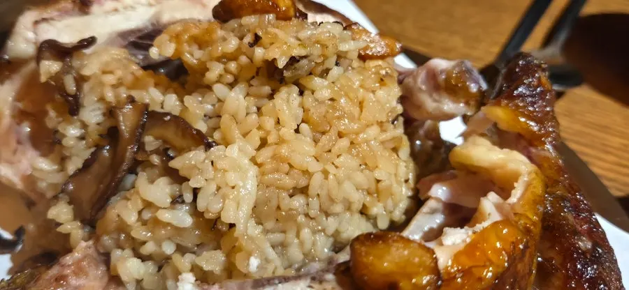 Nutty mushroom rice from inside the whole fired chicken