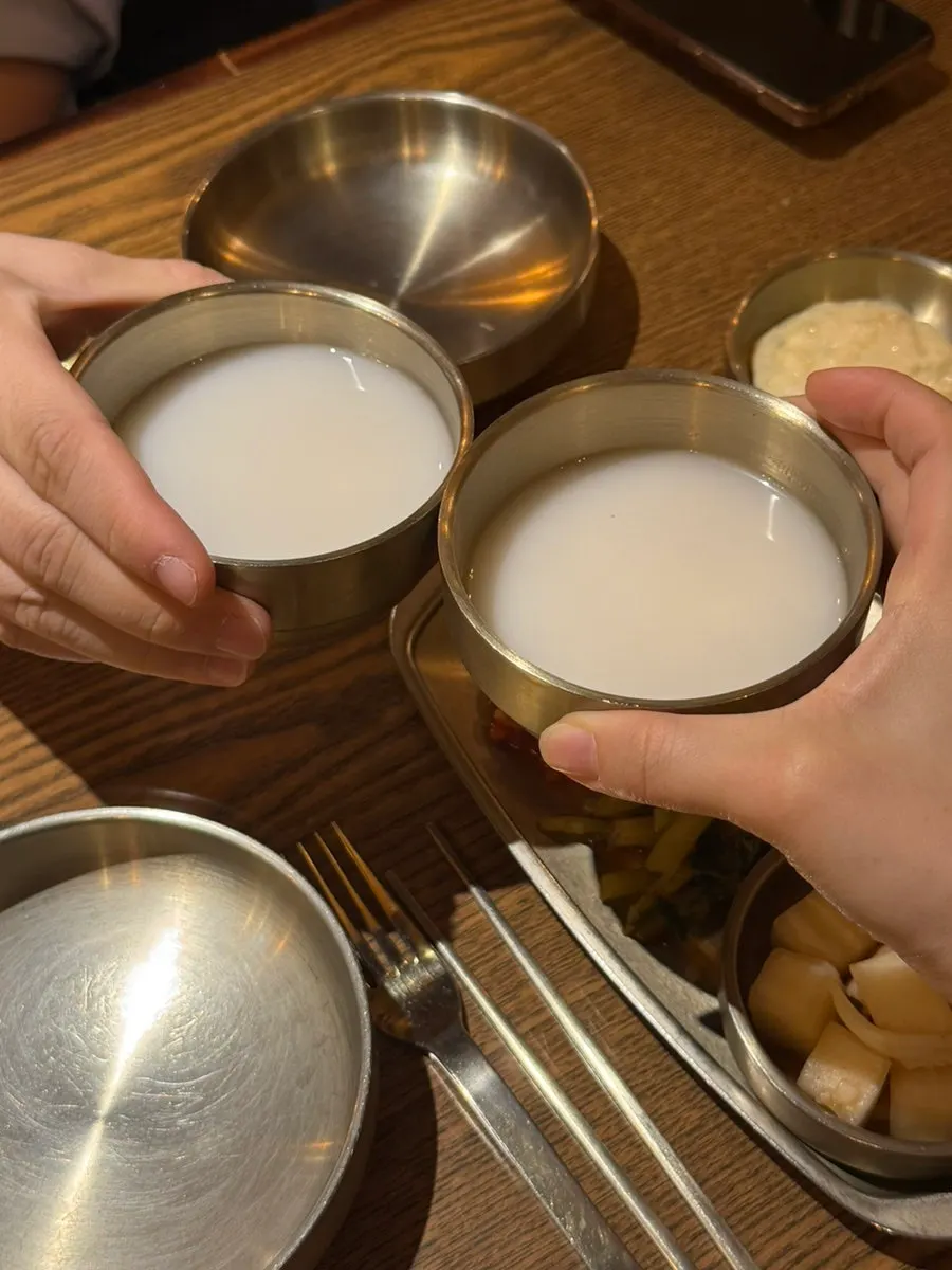 A glass of makgeolli on the table