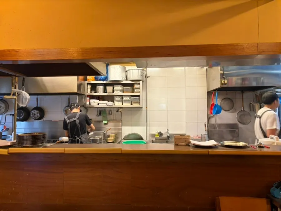 Clean, well-managed kitchen with cooking in progress