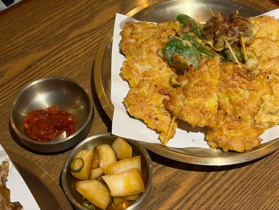 A plate of assorted chicken jeon