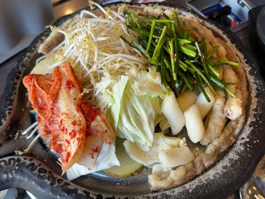 Beef gopchang and vegetables on the grill