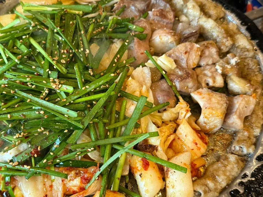Beef gopchang dipped in the special sauce