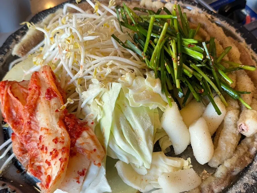 A full plate of grilled beef gopchang at Jinseong Hanwoo Gopchang in Sindang-dong