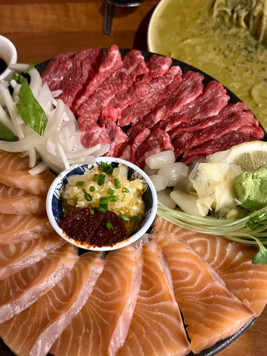 Table spread with soju and Kirin draft beer together