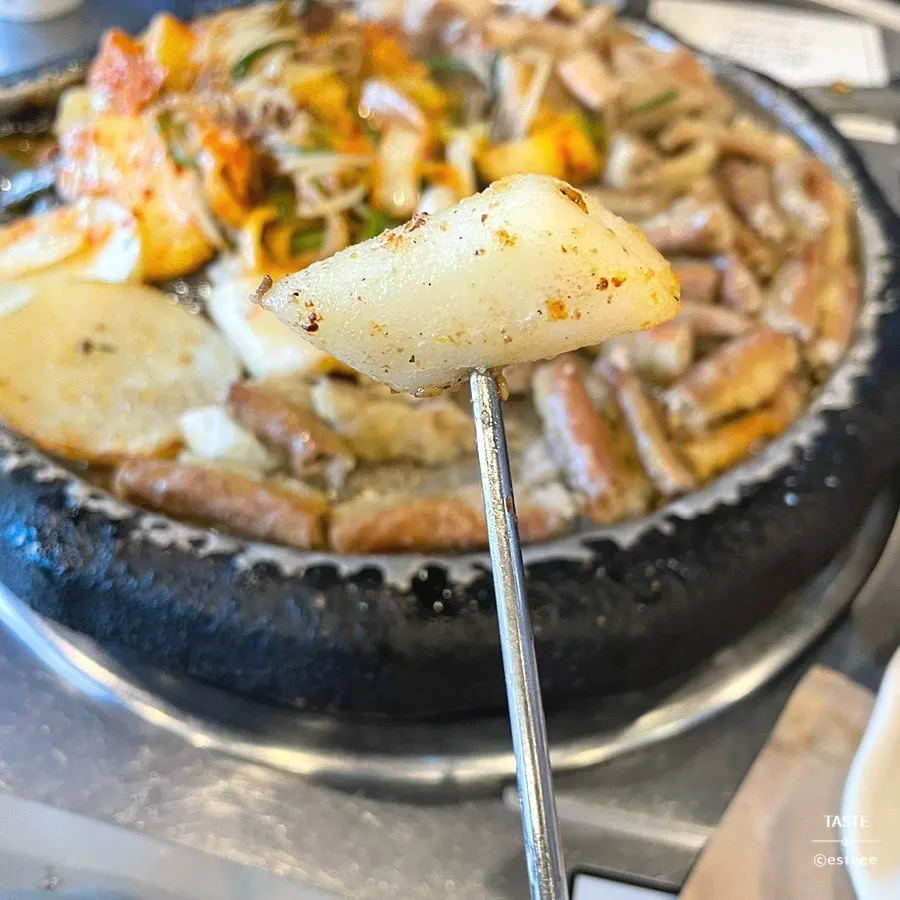 Grilled gopchang with potatoes, cabbage, and bean sprouts