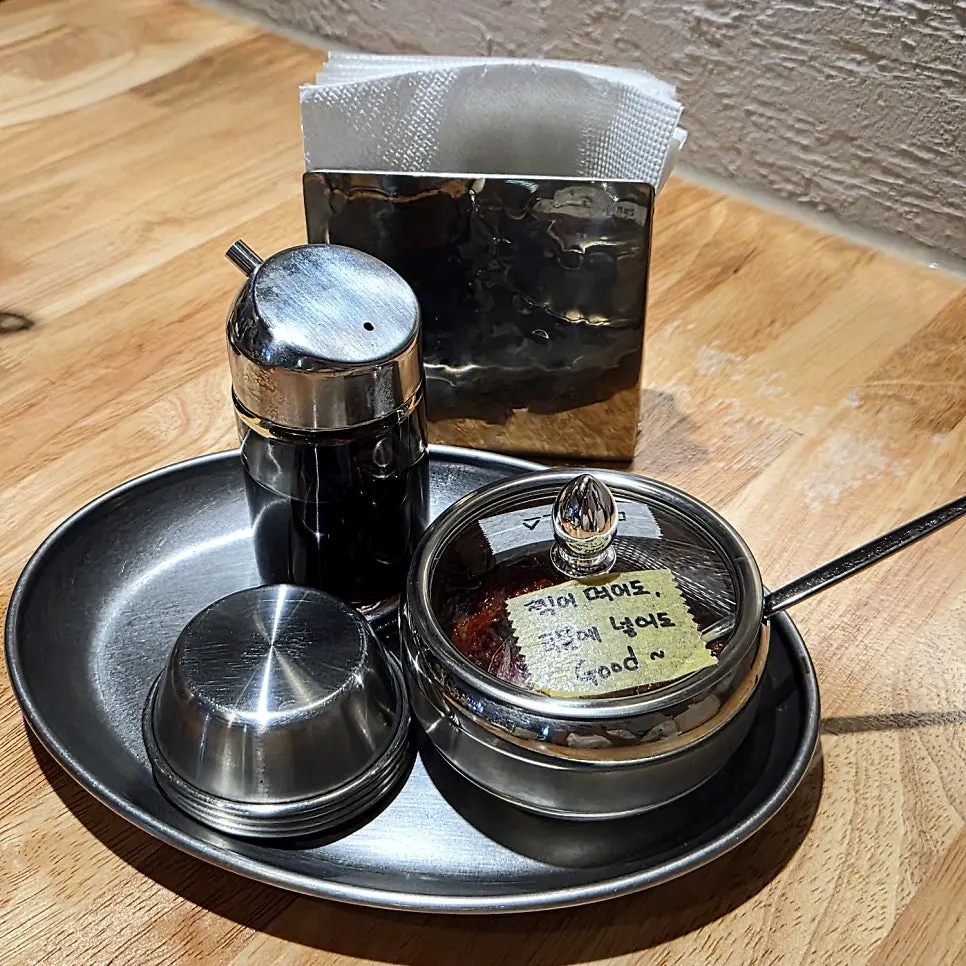 Bowls of soy sauce and dadaegi seasoning