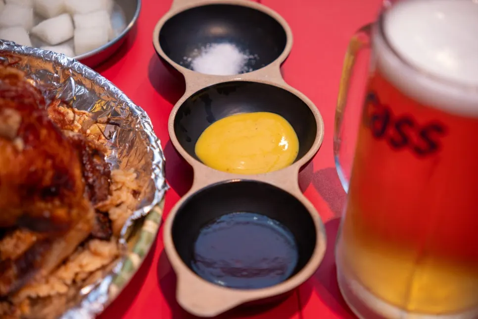 Sauce served alongside the golden chicken