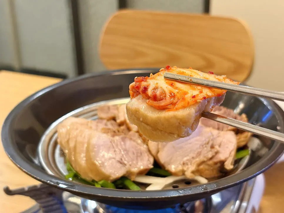 Close-up of glossy, tender bossam pork