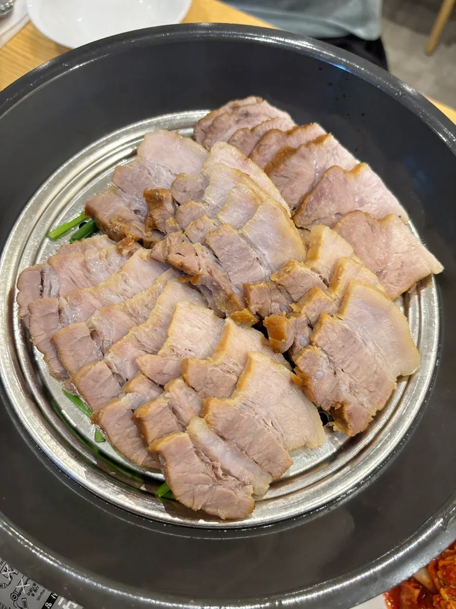 Bossam served with chives