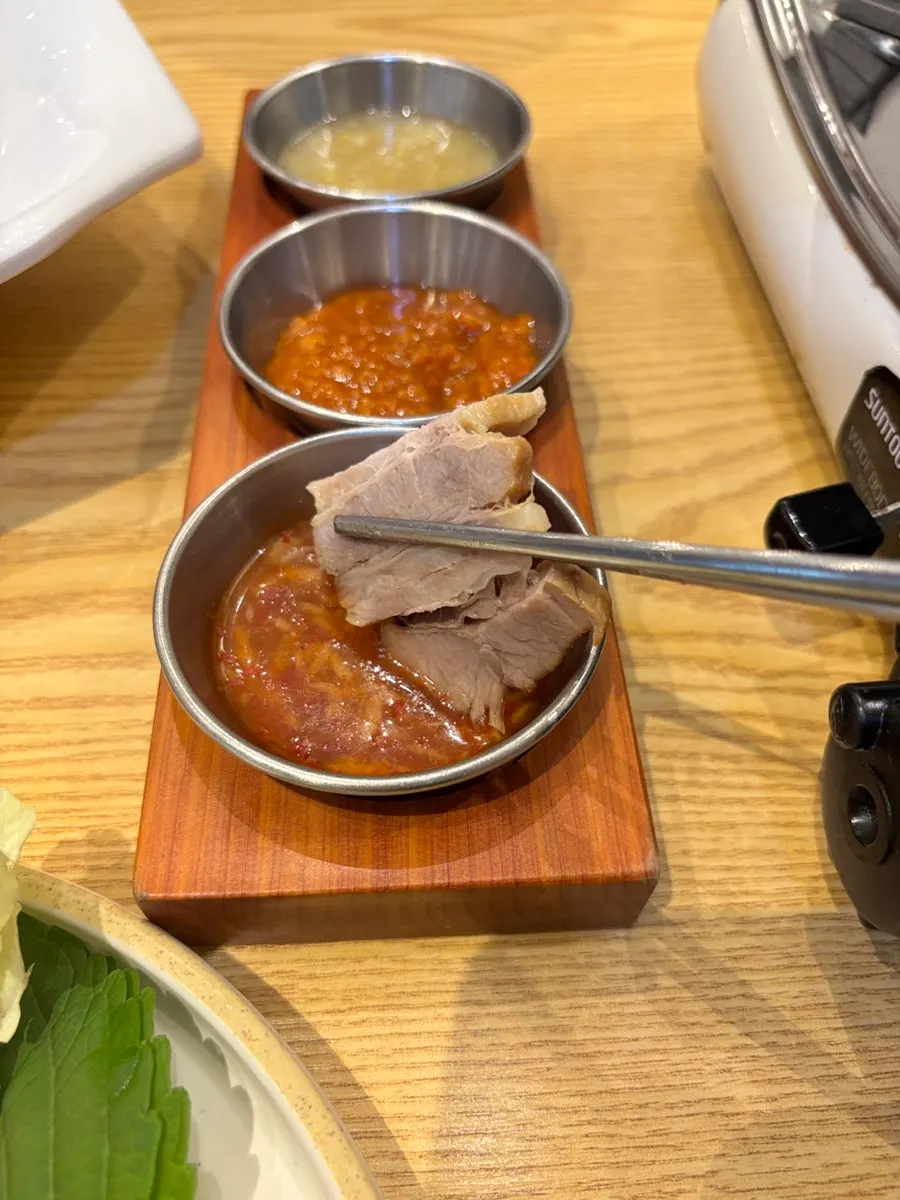 Bossam with accompanying sauces