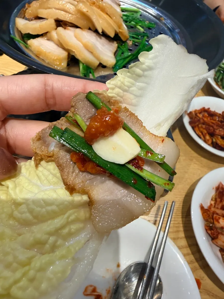 Bossam wrapped in lettuce