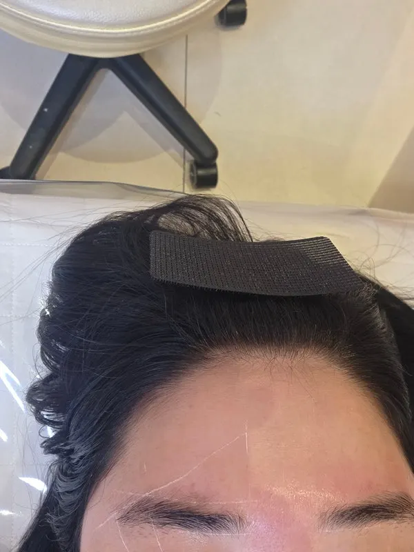 Brushing through the eyebrow hairs during consultation