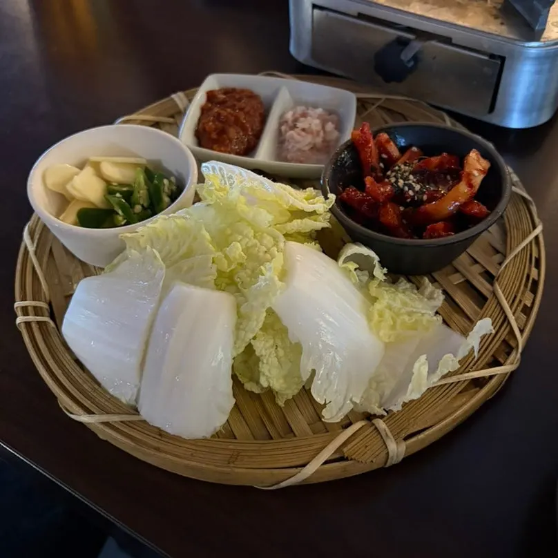 Boiled pork platter served over a flame
