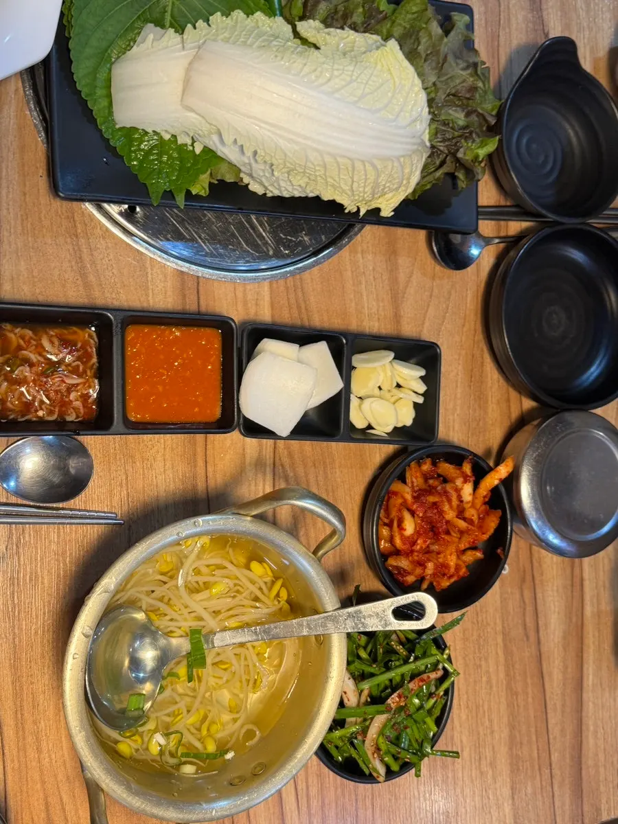 A bowl of bean sprout soup served alongside the meal