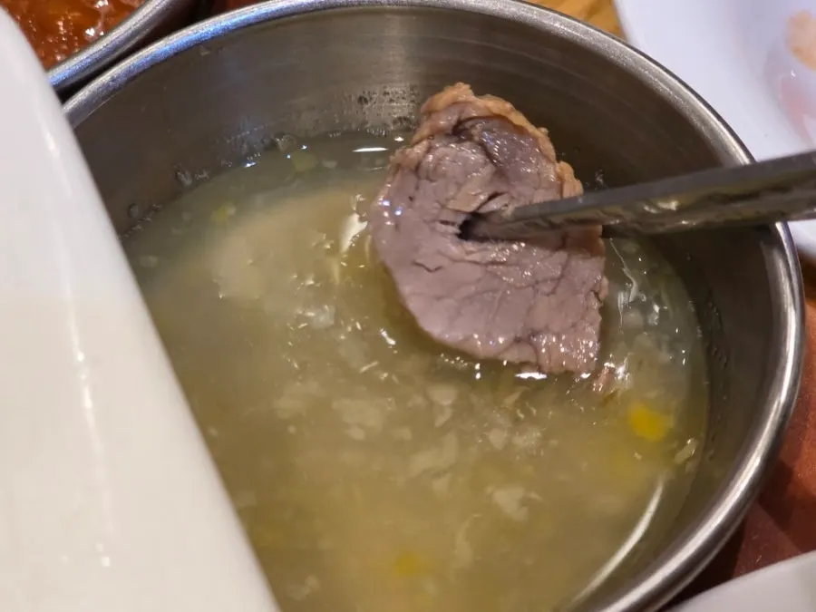 Bossam plate piled high with the added extra meat
