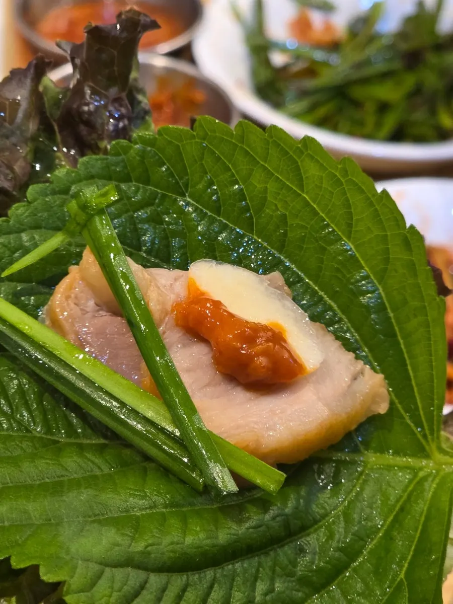 Bossam meat paired with an assortment of sauces
