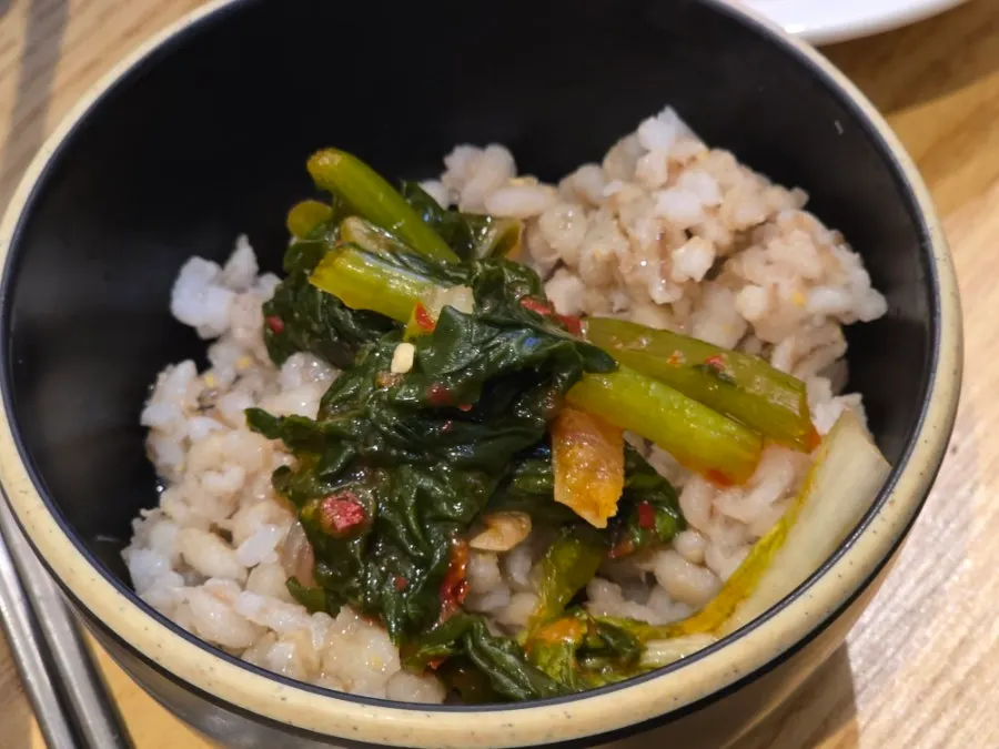 Barley rice mixed with gochujang and sesame oil