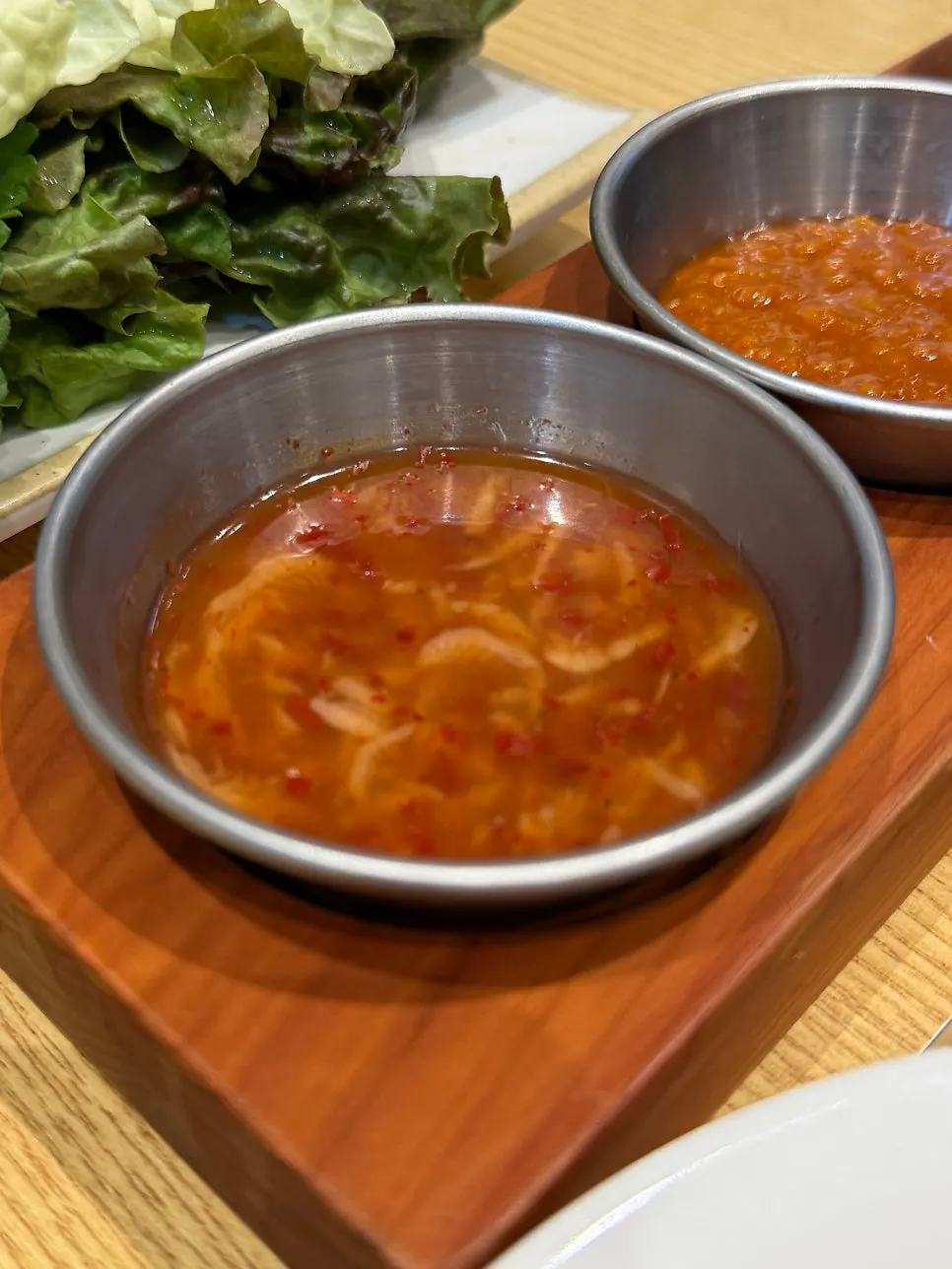 Bossam served over a steamer lined with chives