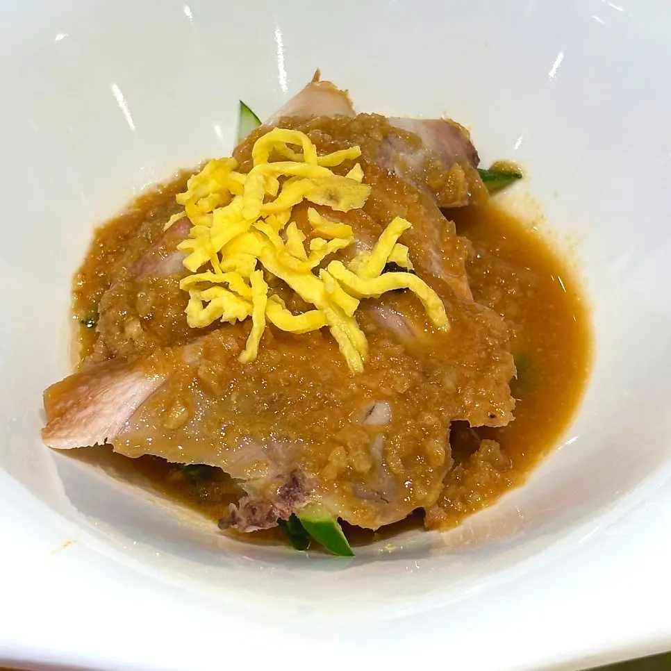 Complimentary spicy cold jokbal salad