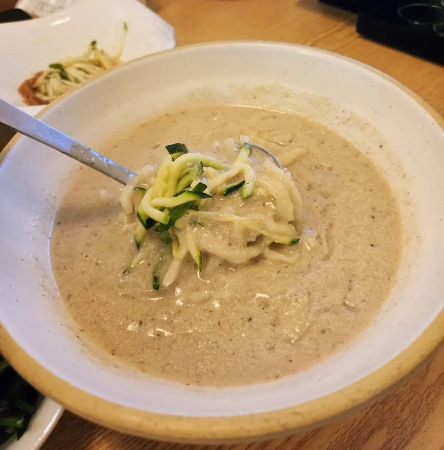 A steaming bowl of perilla kalguksu