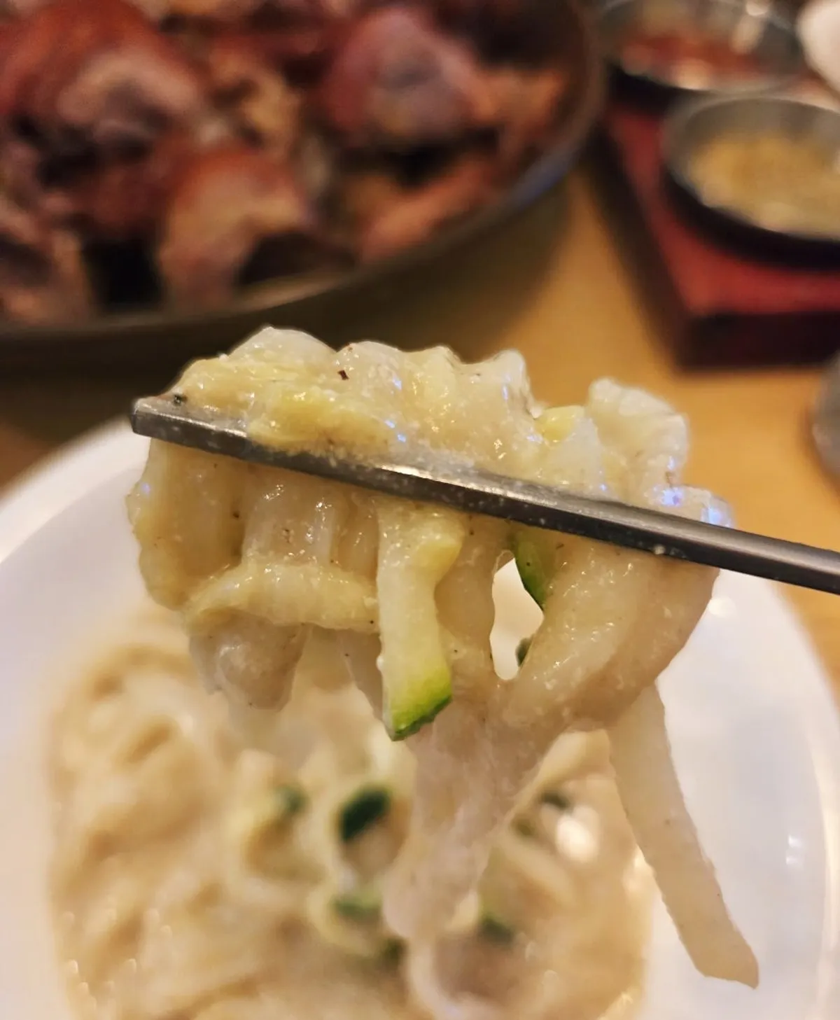 Thick perilla broth with kalguksu noodles