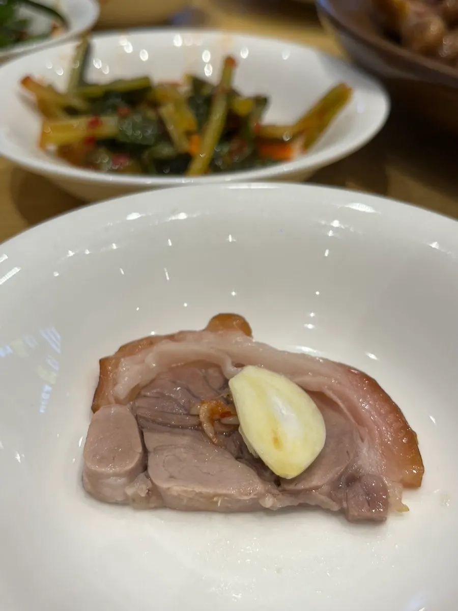 Tray makguksu topped with egg garnish