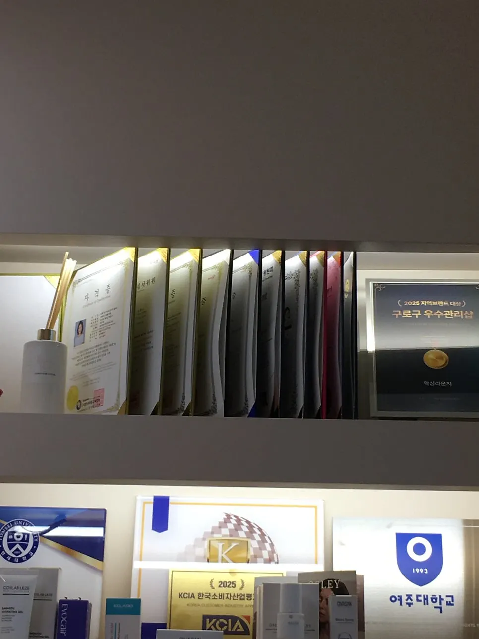 Certifications and awards displayed in the store