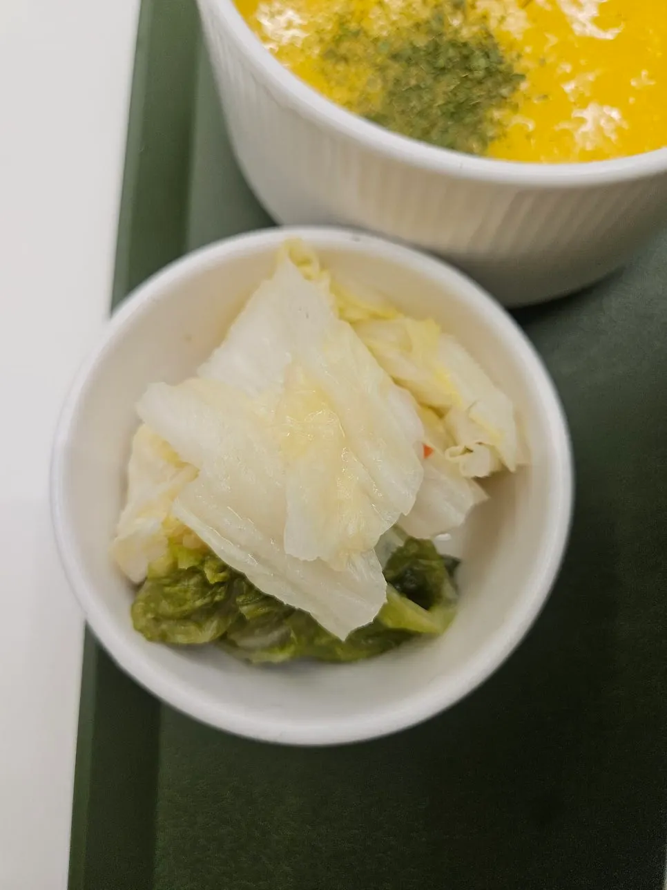 Baek-kimchi served alongside the poke