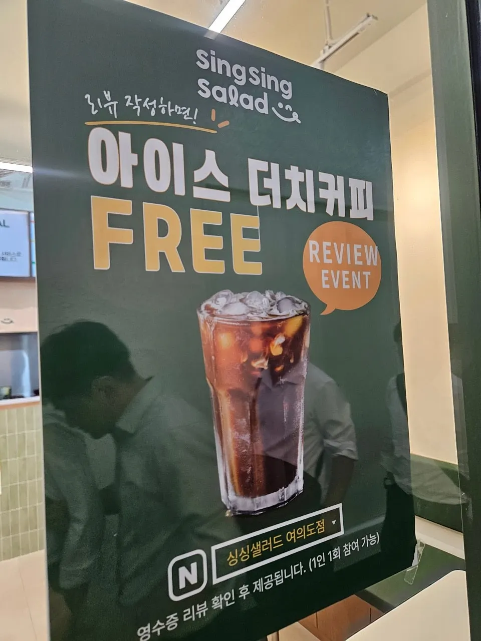Sign advertising free cold brew coffee for writing a review