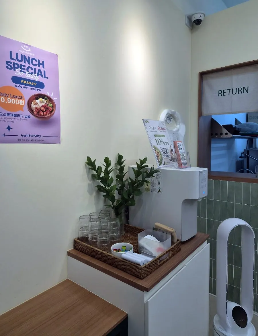 Water dispenser and candy corner set up in the store
