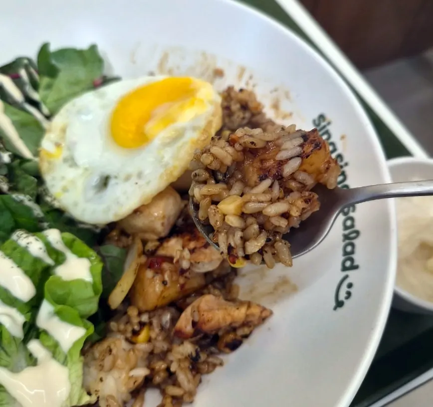 Chili stir-fry salad showing chicken breast, pineapple, and corn