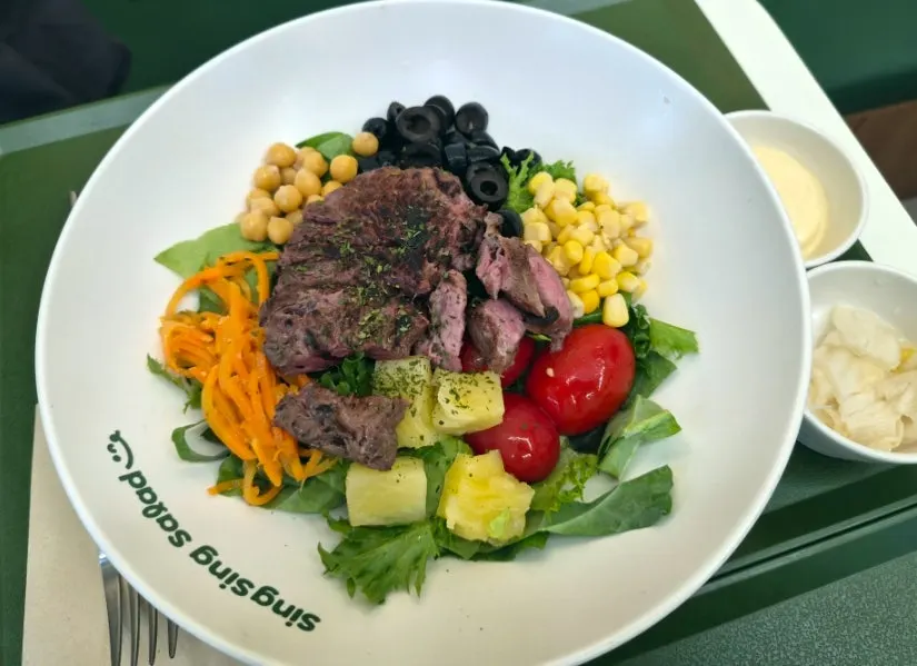 Sous vide beef flap steak salad with carrot slaw and chickpeas