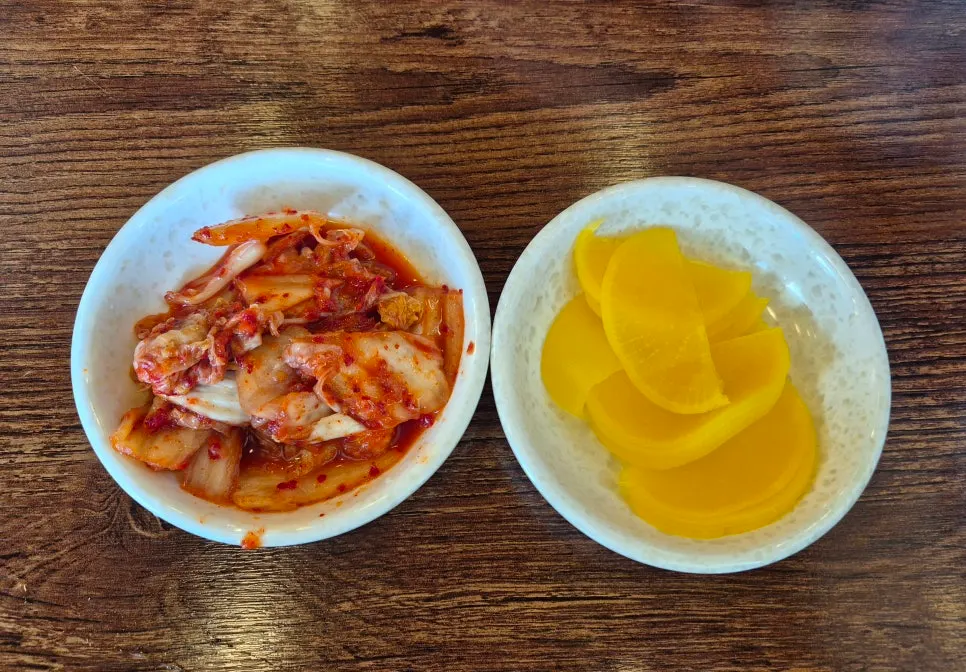 Side dish spread of kimchi and pickled radish
