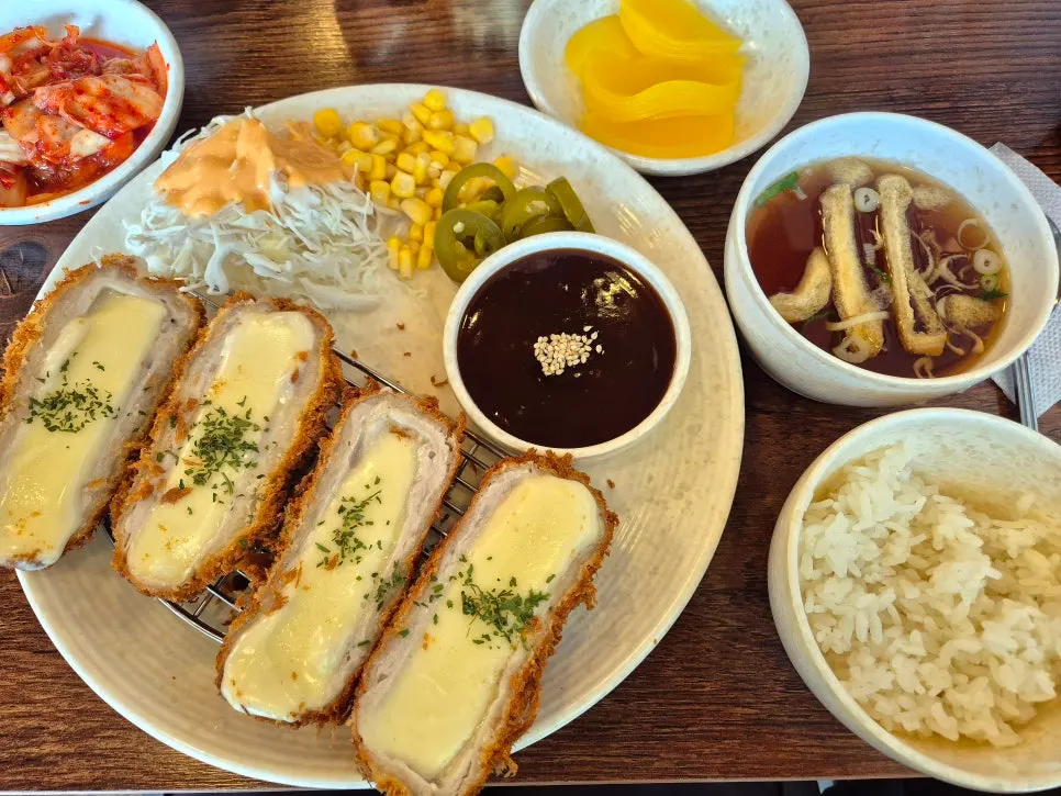 Plate of cheese donkatsu with side dishes