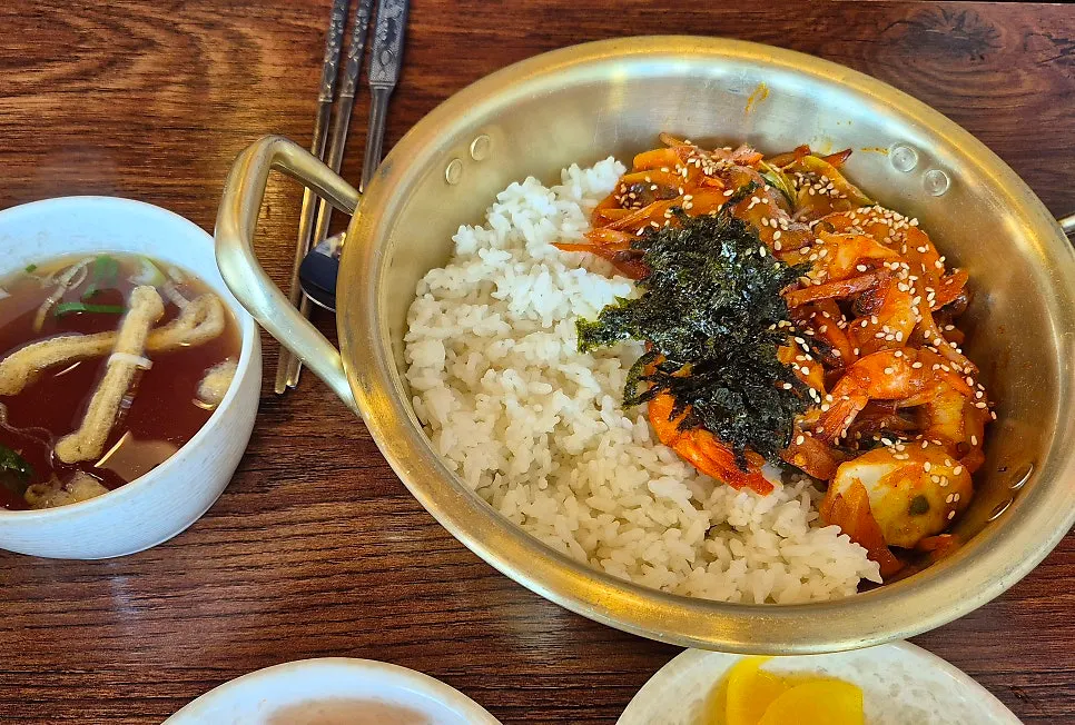 Table set with cheese donkatsu and whole shrimp rice bowl
