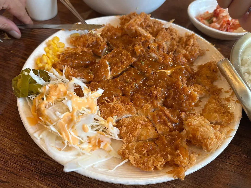 Cross-section of the cutlet with sauce soaked in