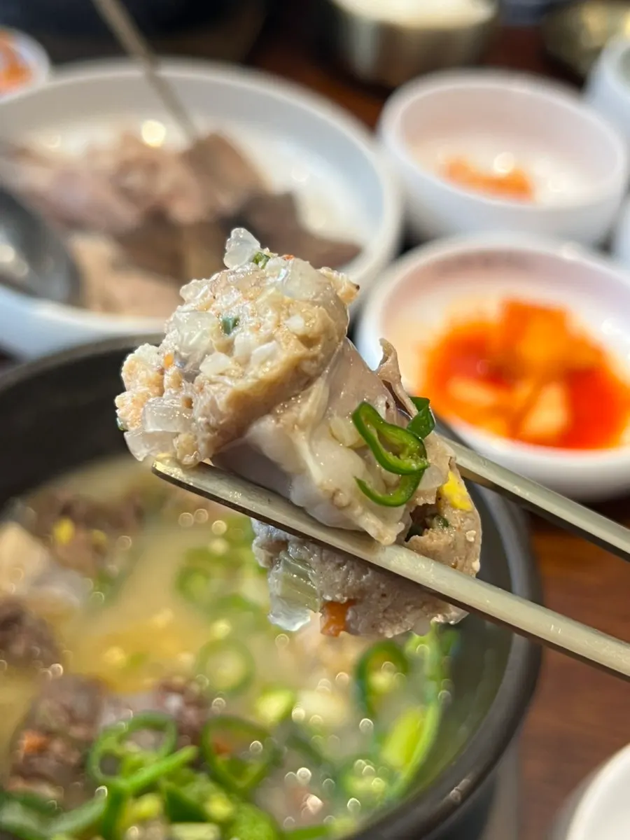 Earthenware pot of basic Myeongin Sundaeguk with milky broth