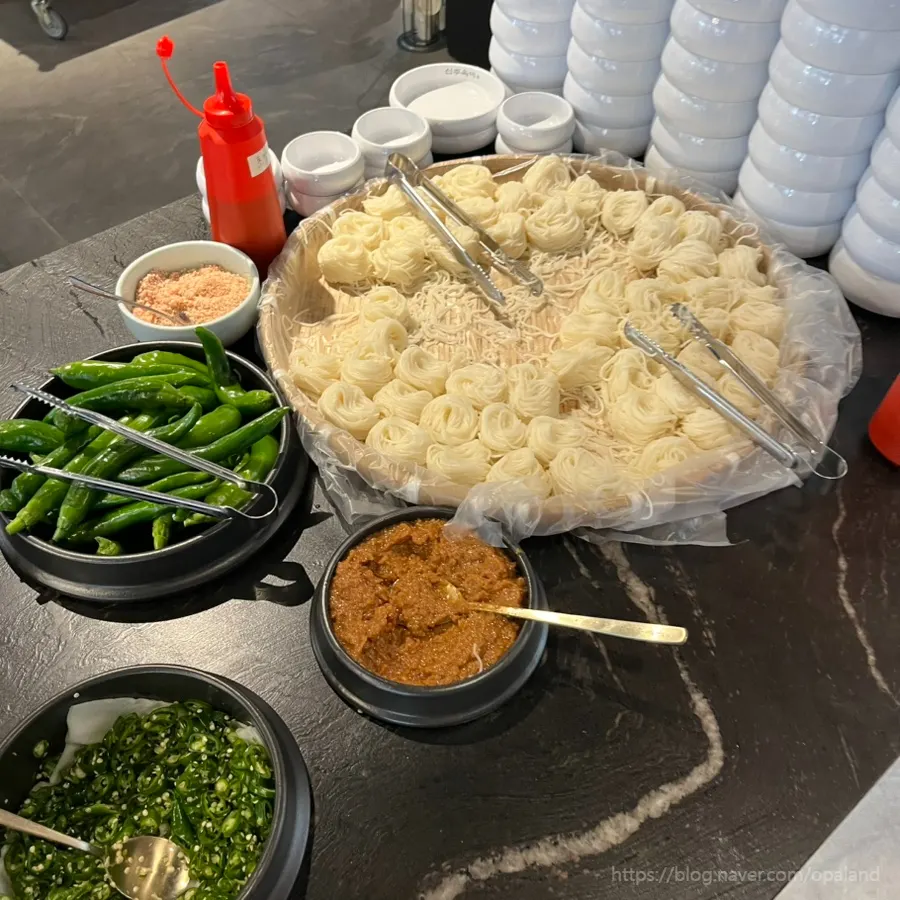 Self-bar stocked with chives and somyeon noodles