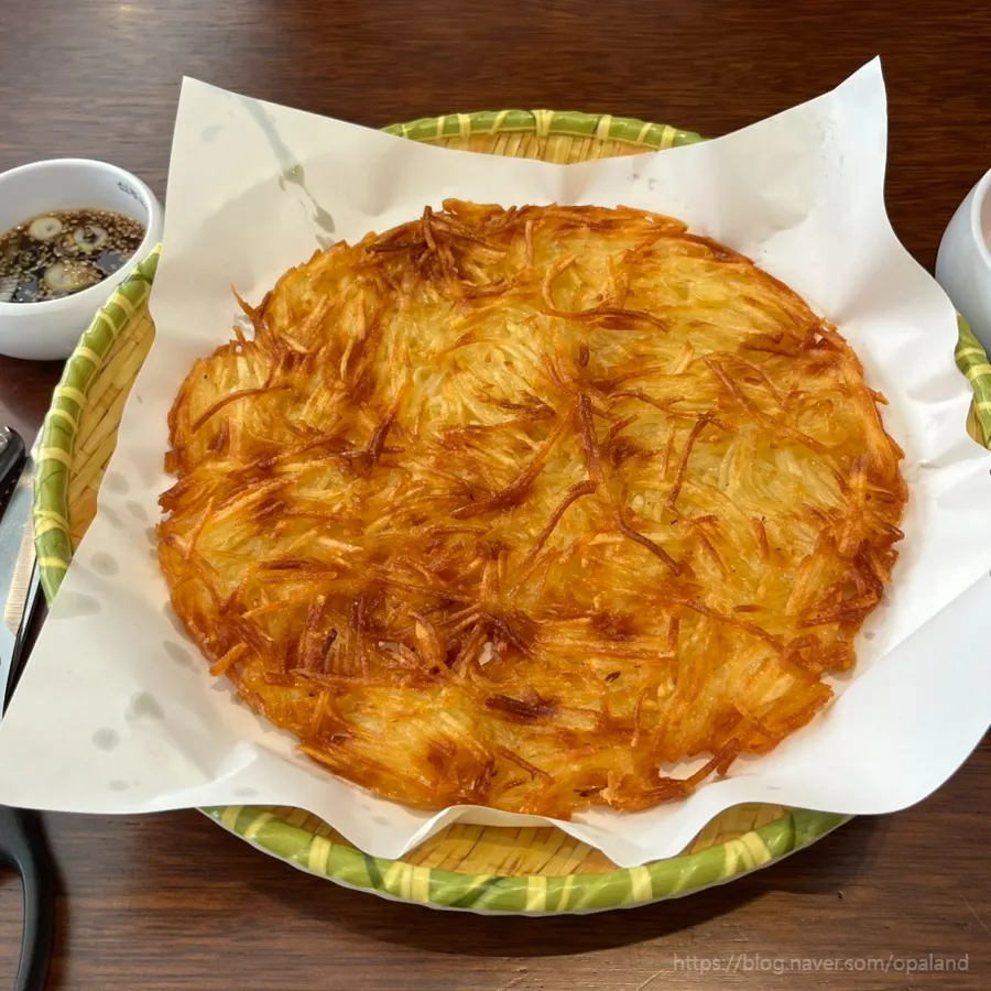 Crispy shredded potato pancake served on a plate