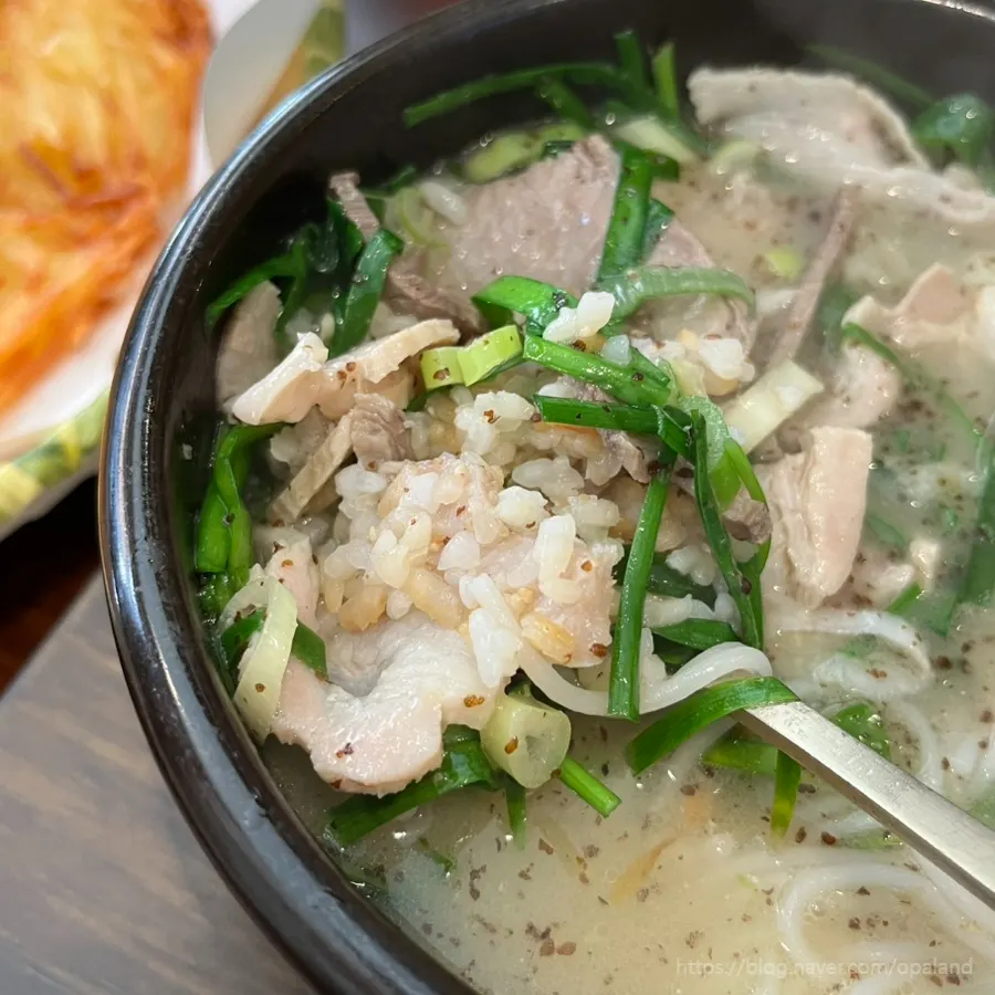 Scooping up glutinous rice nurungji from the broth