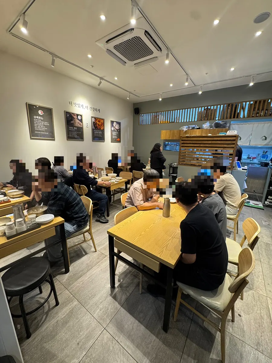 Bright, clean interior of Sambaekga with tables