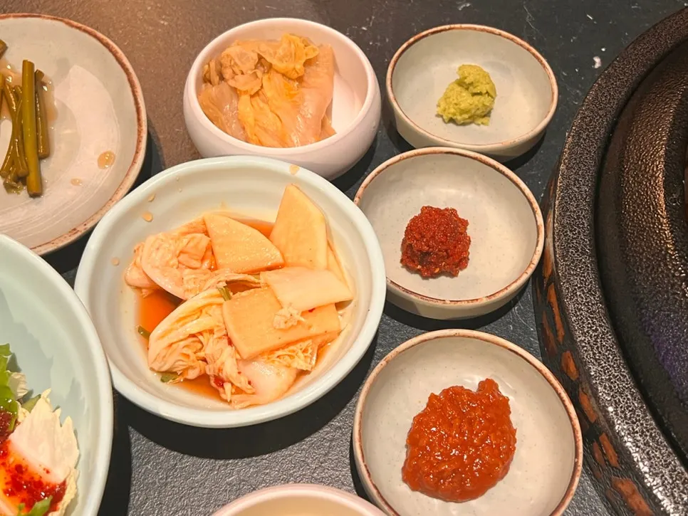 Banchan in minimalist small dishes