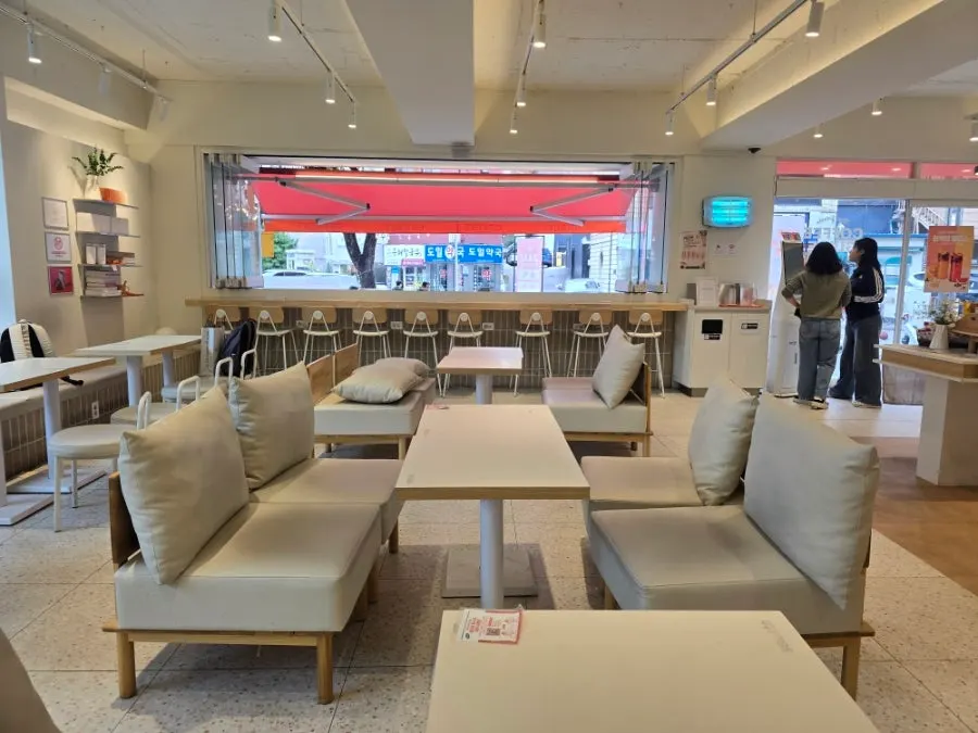 Generous spacing between café seats