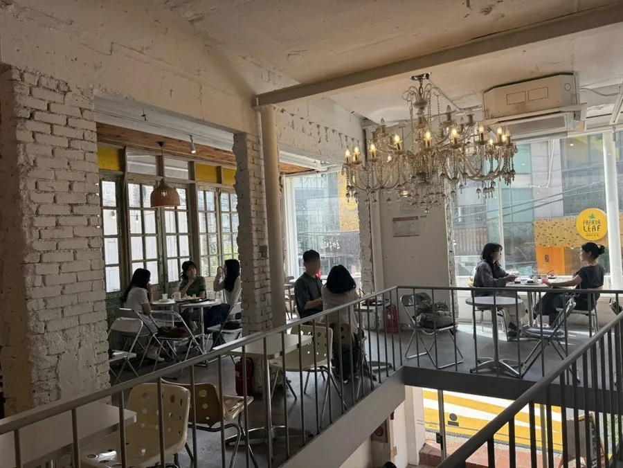Something About Coffee interior packed with customers