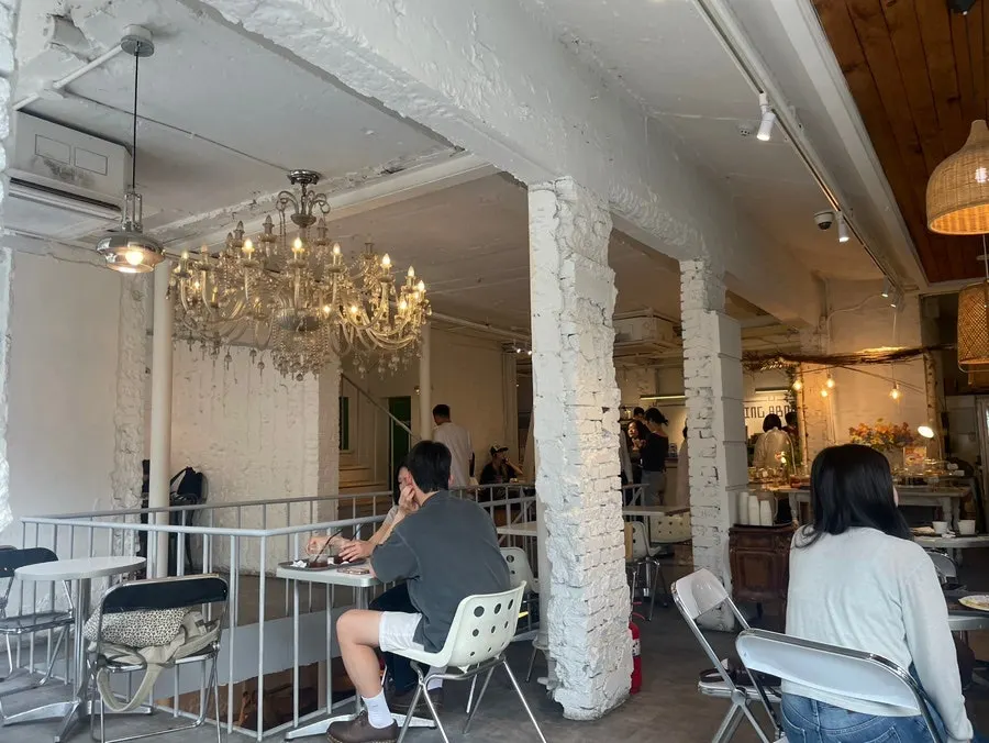 Seating views across the different floors of Something About Coffee