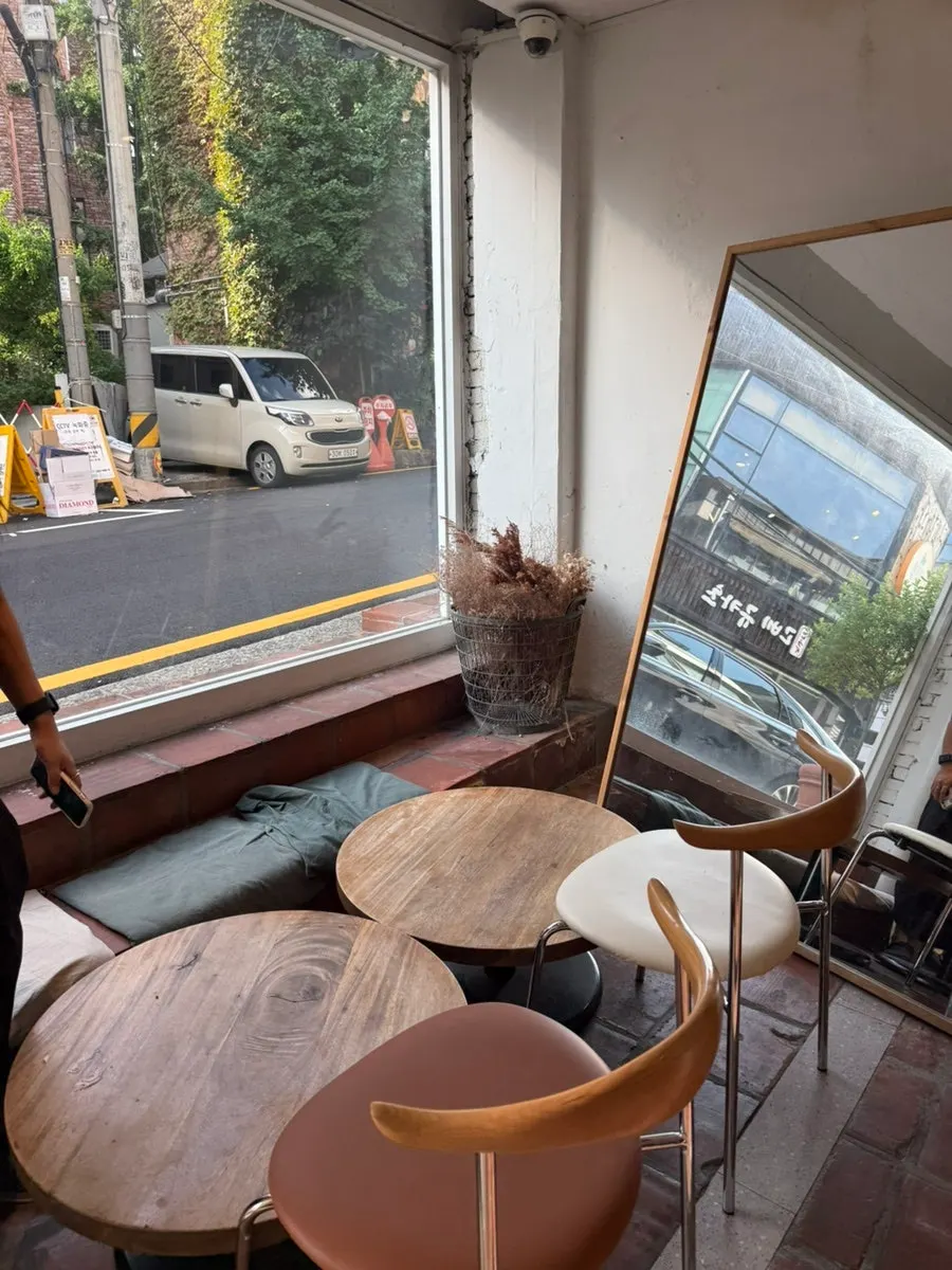 Vertical shot of the interior space at Something About Coffee