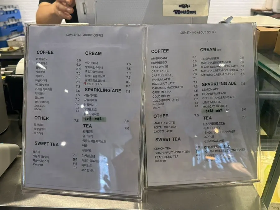 Sign highlighting cream drinks as the signature menu