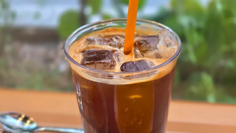 Iced americano enjoyed alongside the desserts