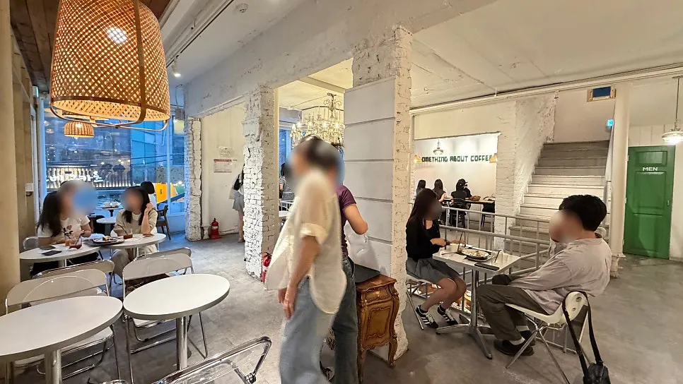 Spacious indoor seating at Something About Coffee