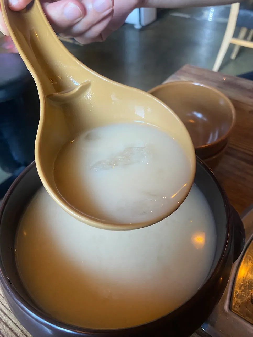 Icy nurungji makgeolli poured into a glass